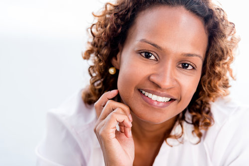 Confident African American business woman - isolated over a white background
